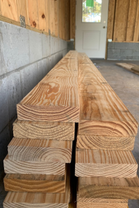 Stack of high quality, dense lumber for framing